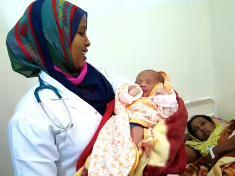 Doctor and baby