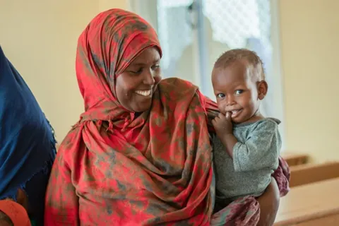 Happy mother and baby